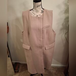 Sleeveless long line coat